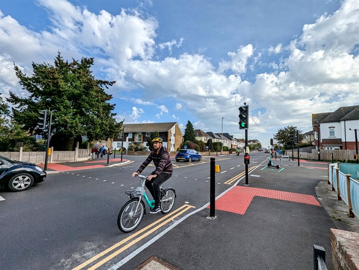 person riding bicycle on Fernside Road