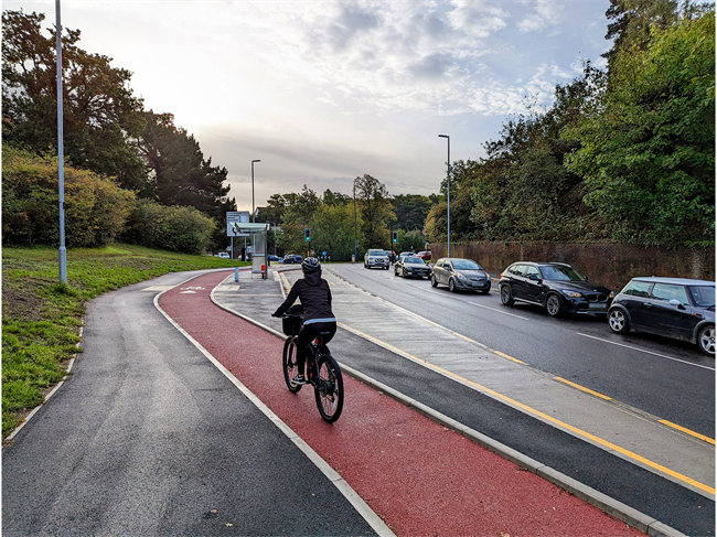 Whitelegg way bus stop person riding bike