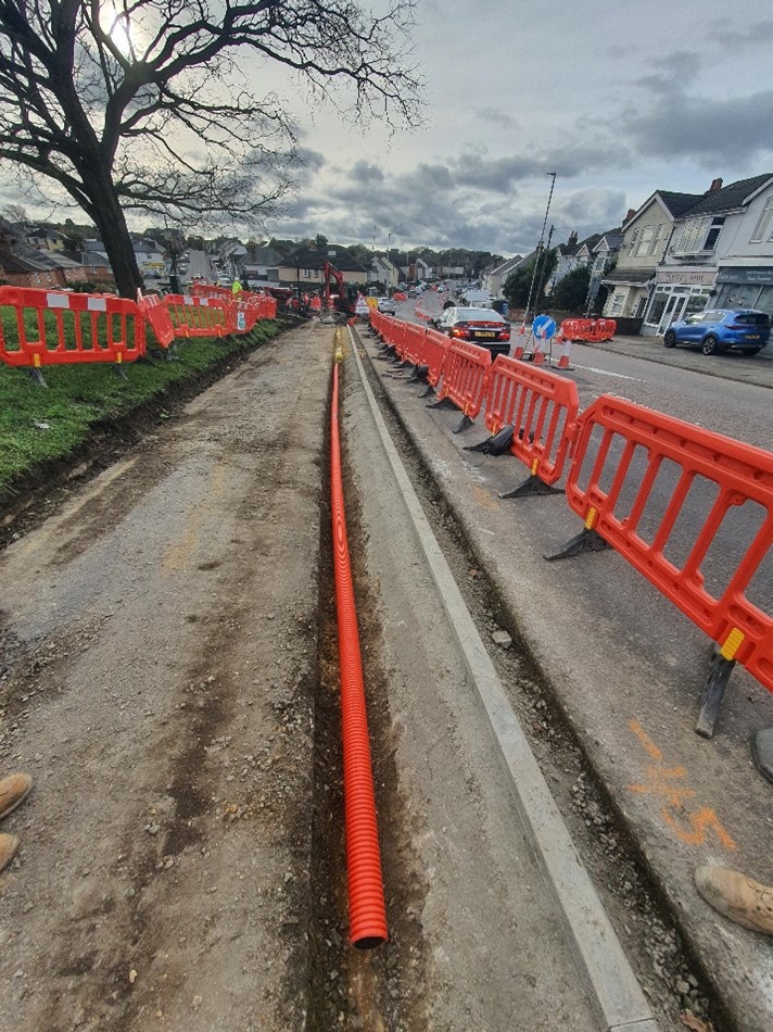 Construction of east side two-ways cycle track and signal ducting installation- view toward Sea View Road junction